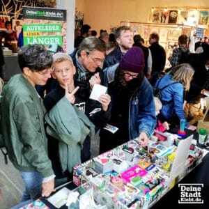 Besucherandrang bei den Berlin Graphic Days am Messestand von DeineStadtKlebt.de